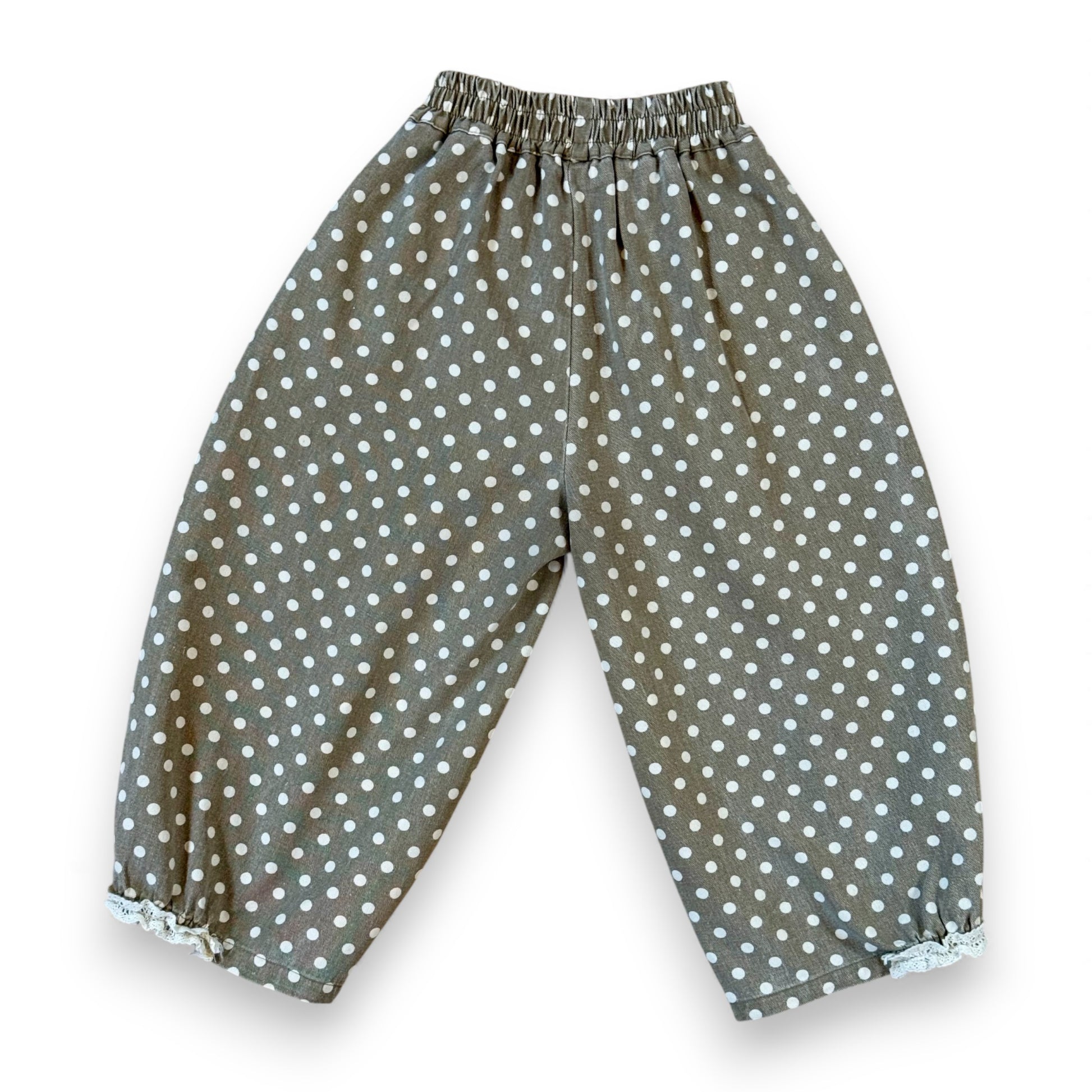 Kehinde Pantaloons in Charcoal Polka Dot – wide-leg cotton denim with lace cuff and elastic waist.