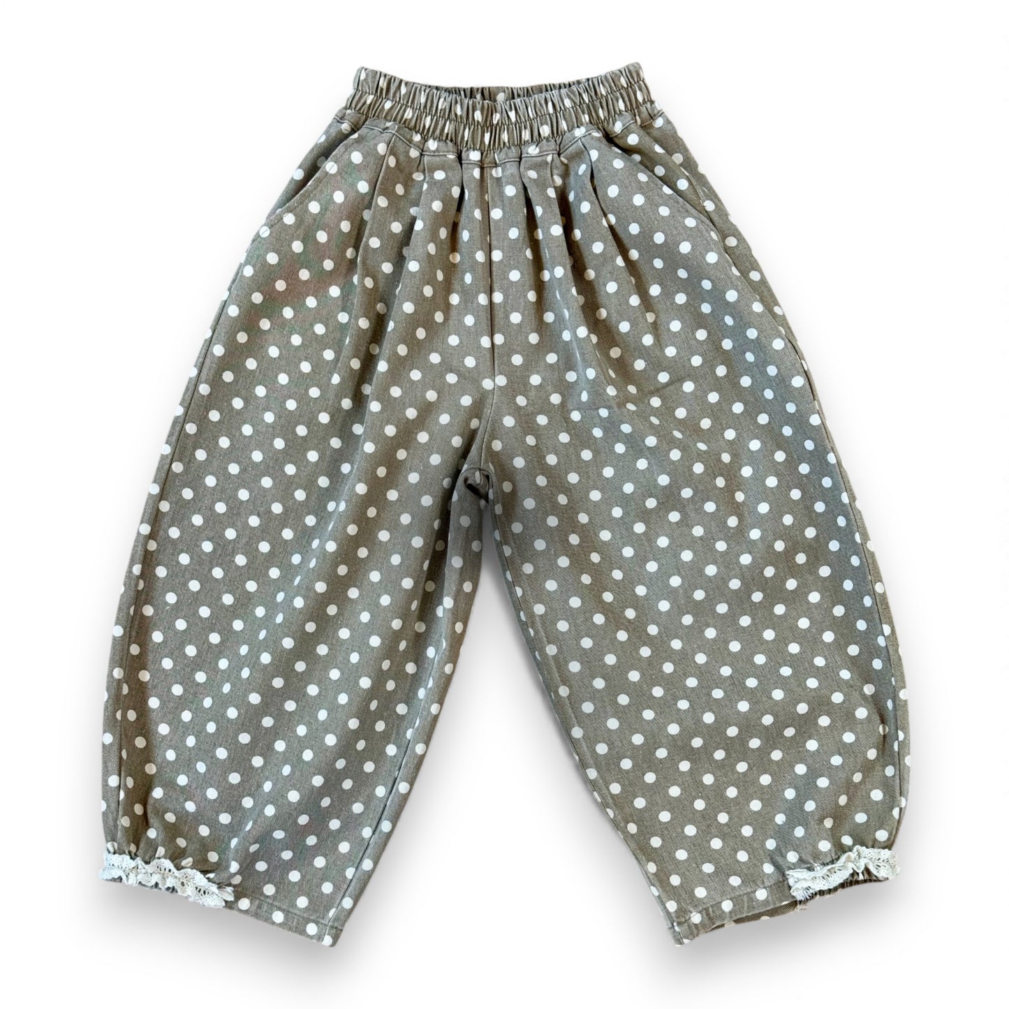 Kehinde Pantaloons in Charcoal Polka Dot – wide-leg cotton denim with lace cuff and elastic waist.