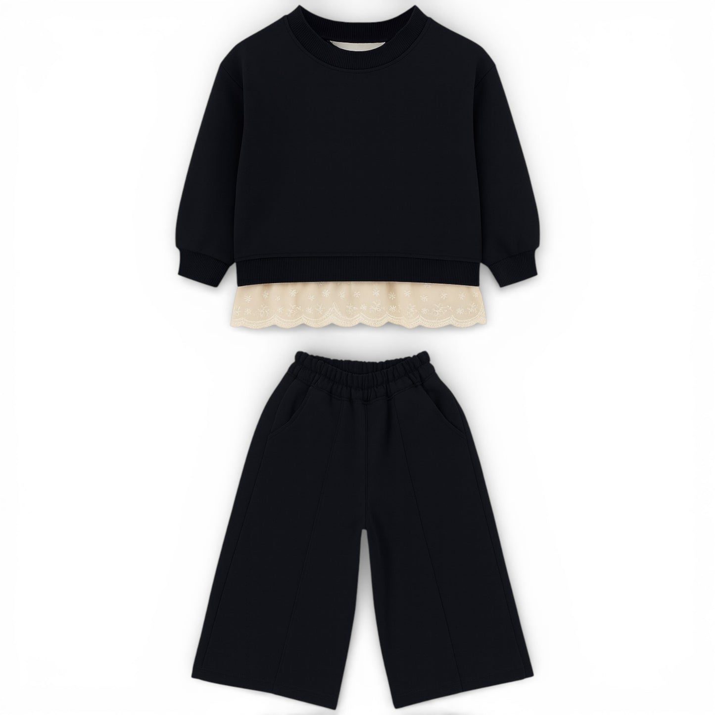Children’s cotton jersey tracksuit with lace hem sweatshirt and wide straight-leg trousers by That’s Not Fair London