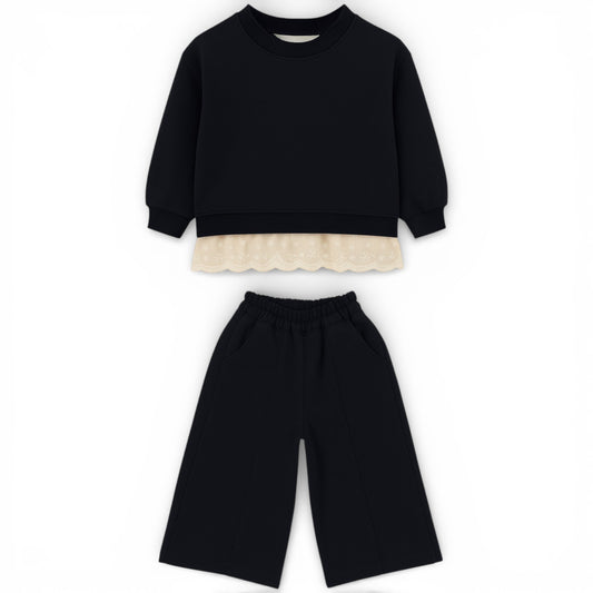 Children’s cotton jersey tracksuit with lace hem sweatshirt and wide straight-leg trousers by That’s Not Fair London