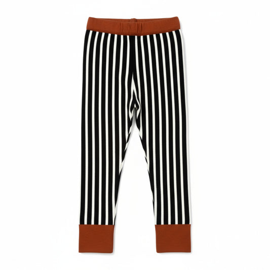 Black and white vertical striped children’s leggings with brown contrast cuffs and waistband