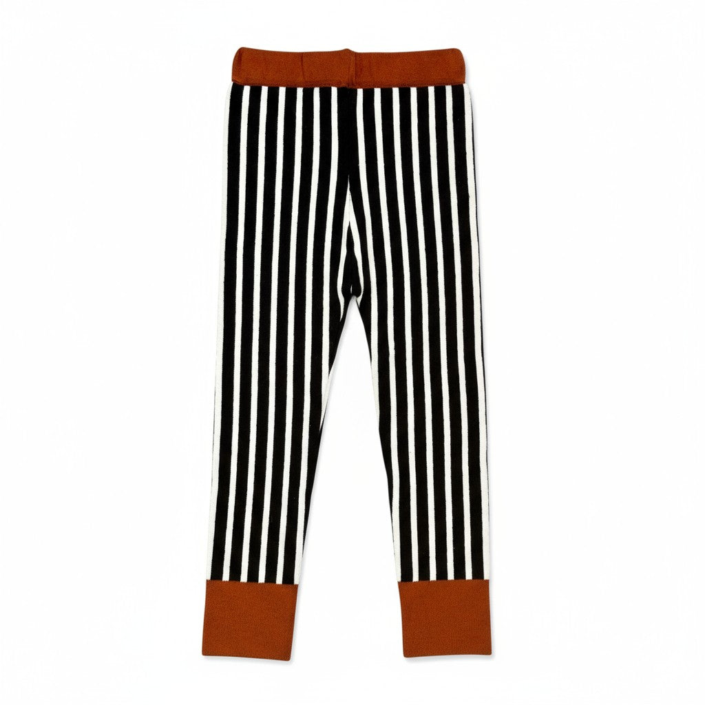 Black and white vertical striped children’s leggings with brown contrast cuffs and waistband