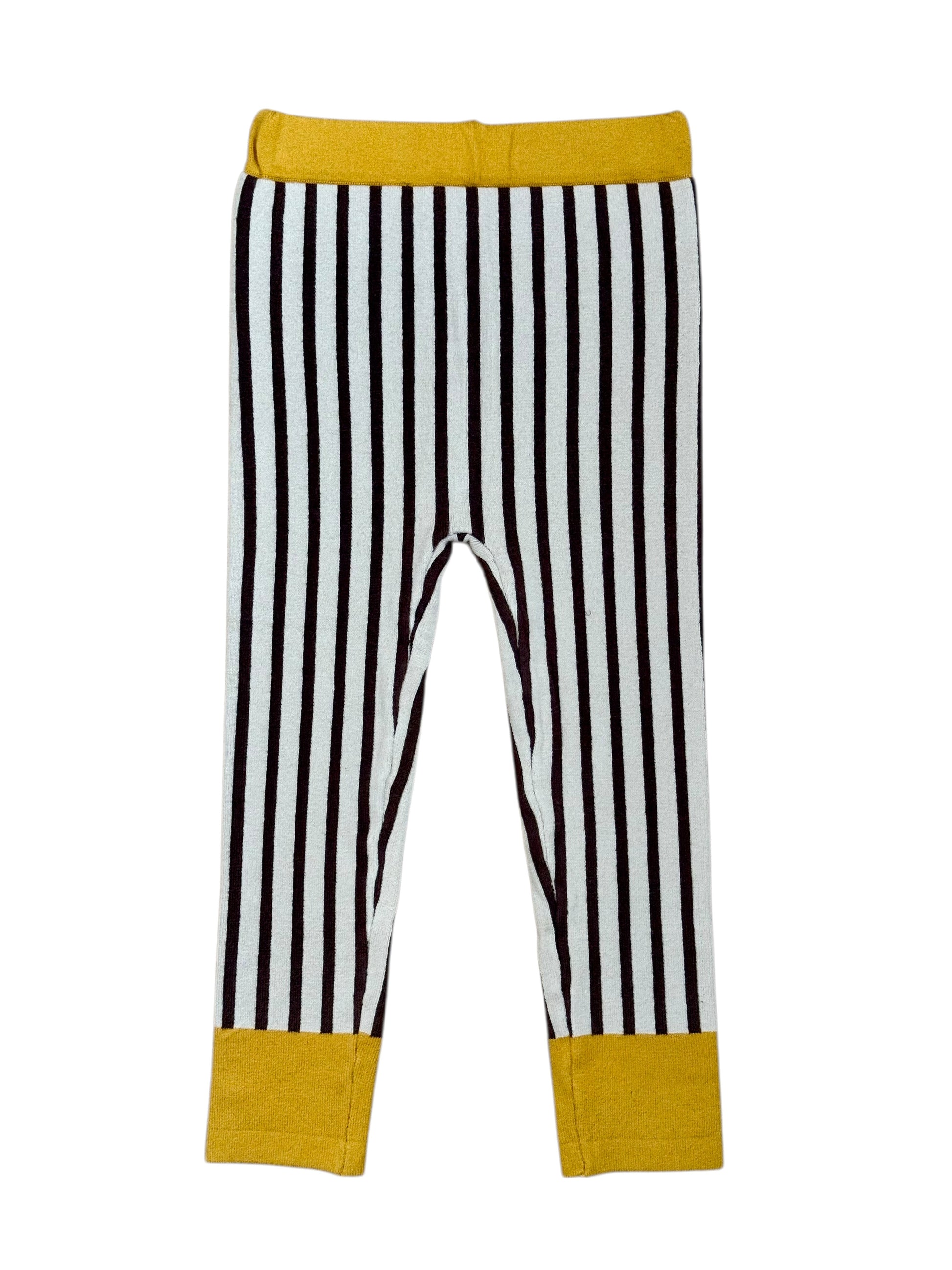 “Black and white striped children's leggings with mustard yellow cuffs and waistband
