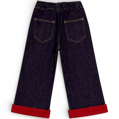 Children’s wide-leg fleece lined denim trousers with elasticated waistband and red turn-up hem