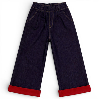 Children’s wide-leg fleece lined denim trousers with elasticated waistband and red turn-up hem