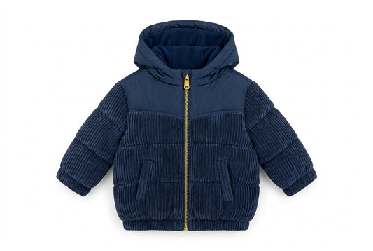Navy children's puffer jacket with hood, wide-ribbed cord-effect sleeves and body panels, front zip and two pockets by That’s Not Fair London.