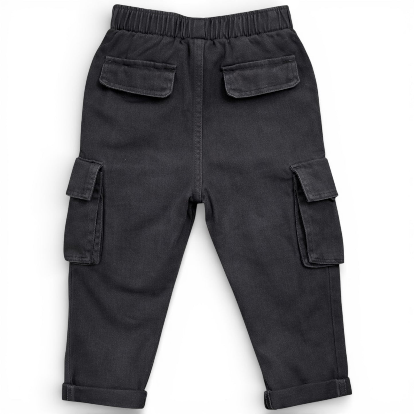 Children’s washed black straight-leg cargo trousers with elasticated waistband and patch pockets by That’s Not Fair London