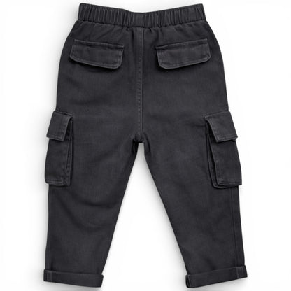 Children’s washed black straight-leg cargo trousers with elasticated waistband and patch pockets by That’s Not Fair London
