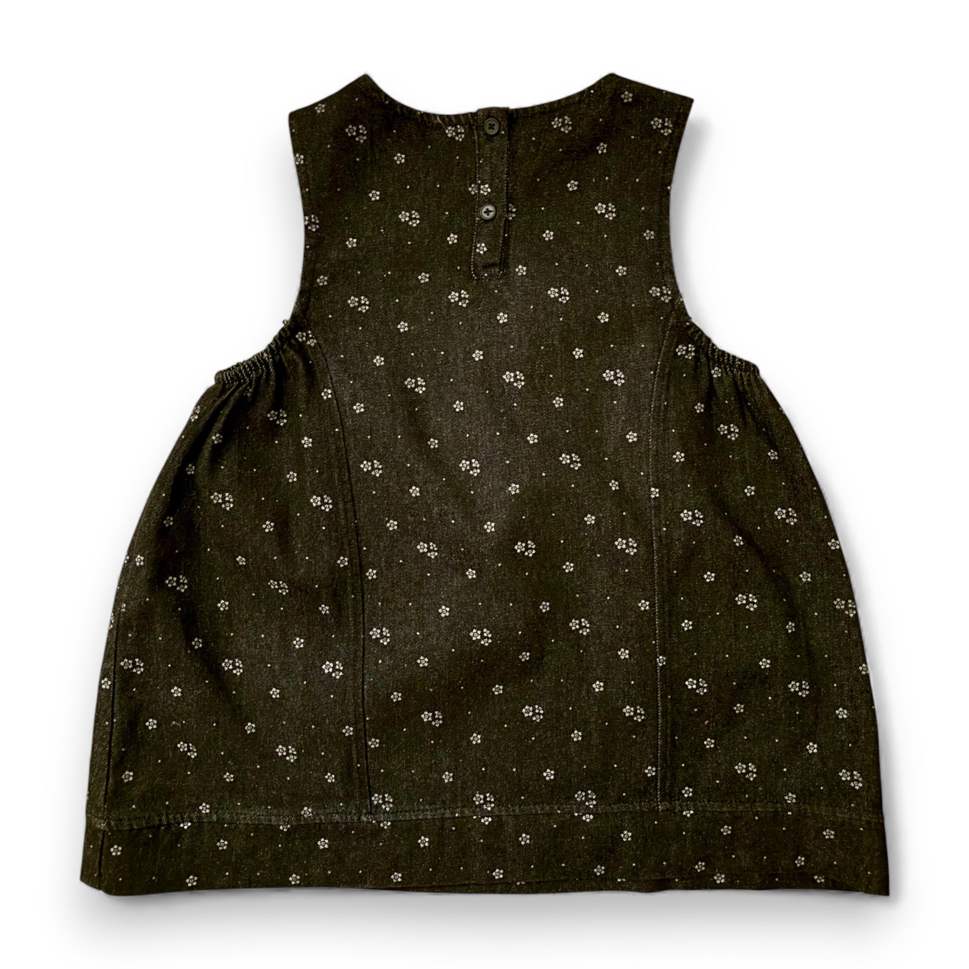 Back view of the Melina dress by That’s Not Fair London, black denim childrens dress with panel construction and button fastening