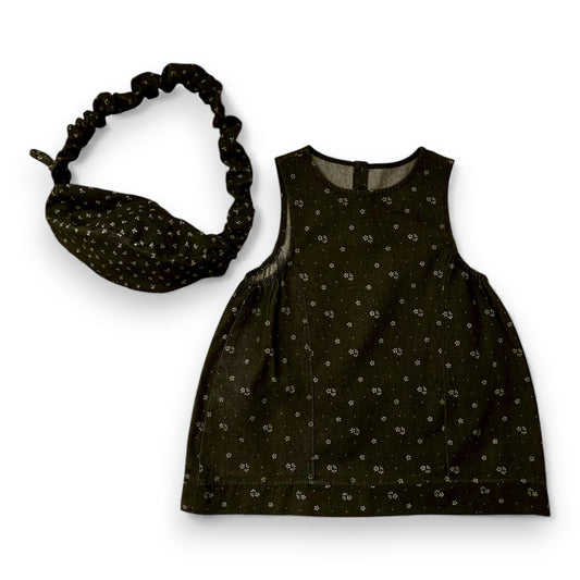 Melina dress and crossbody bag set by That’s Not Fair London, black printed denim childrens dress with matching croissant-shaped bag