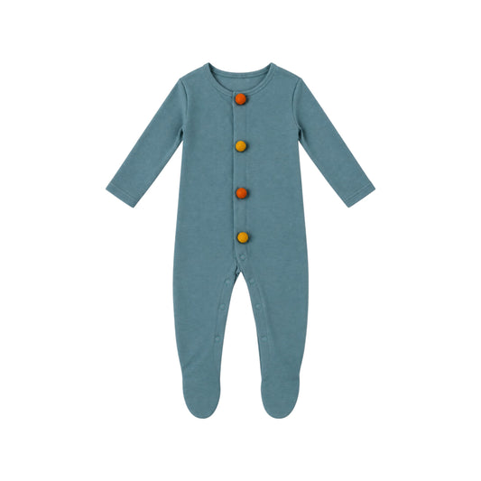 That's Not Fair London Merla baby romper in muted blue with burnt orange and mustard felted bobble details.