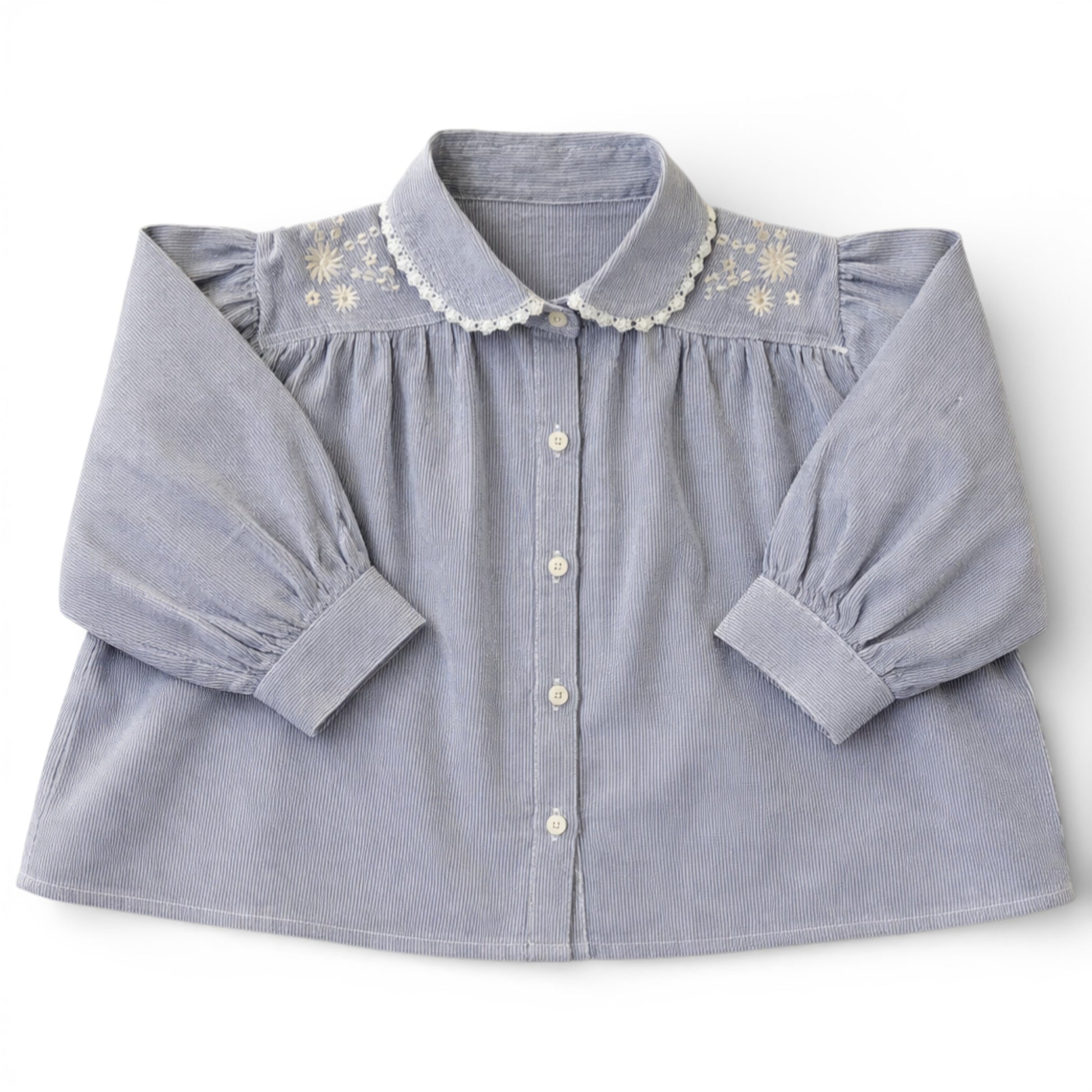 Pinstripe A-line blouse with lace-trimmed Peter Pan collar, embroidery on shoulders and pleated front.