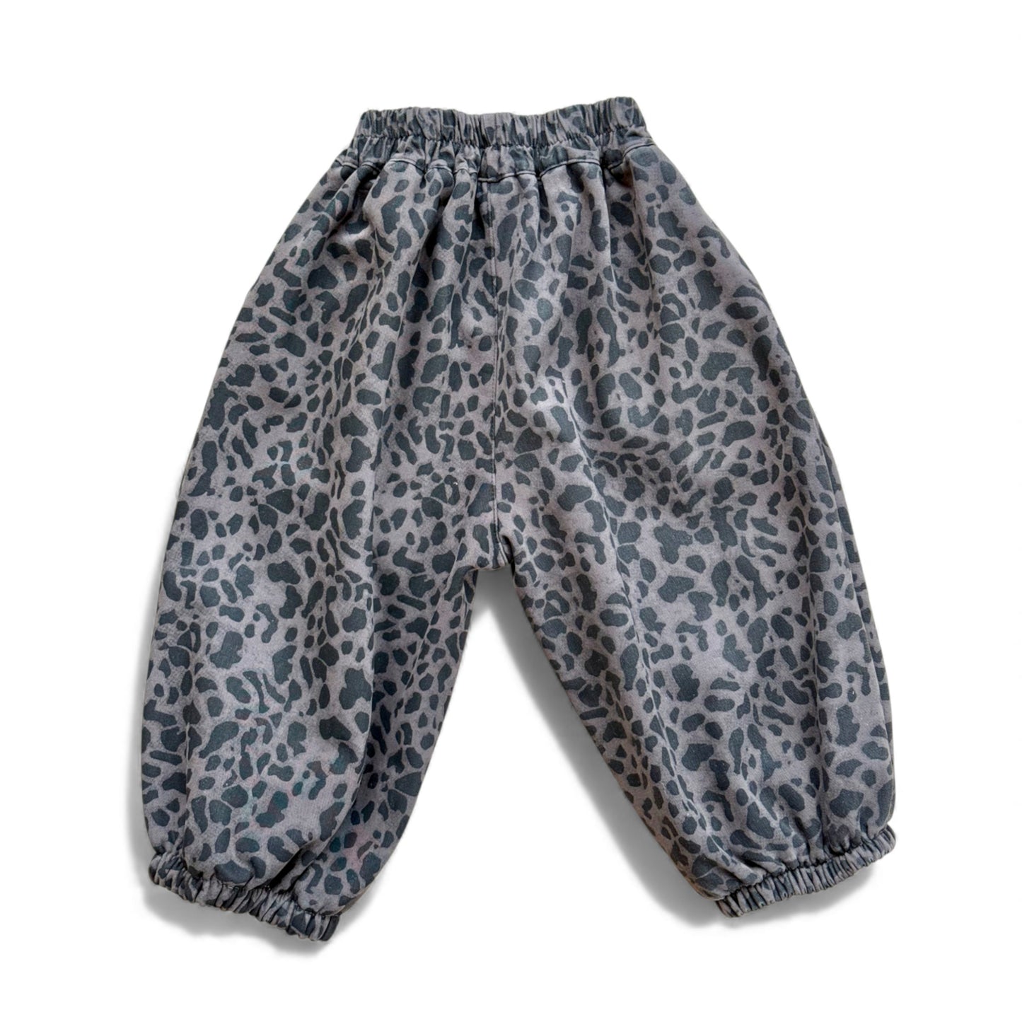 Animal-print children’s balloon pantaloons with high elasticated waist, back yoke, inverted pleats and elasticated cuffs — back view.