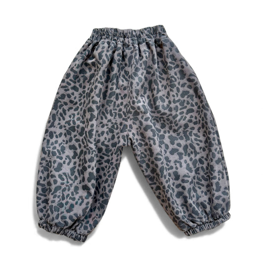 Animal-print children’s balloon pantaloons with high elasticated waist, back yoke, inverted pleats and elasticated cuffs — back view.