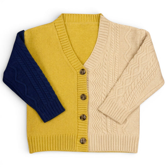 Children’s remnant knit cardigan with cable knit sleeves, plain knit body and ribbed trims by That’s Not Fair London