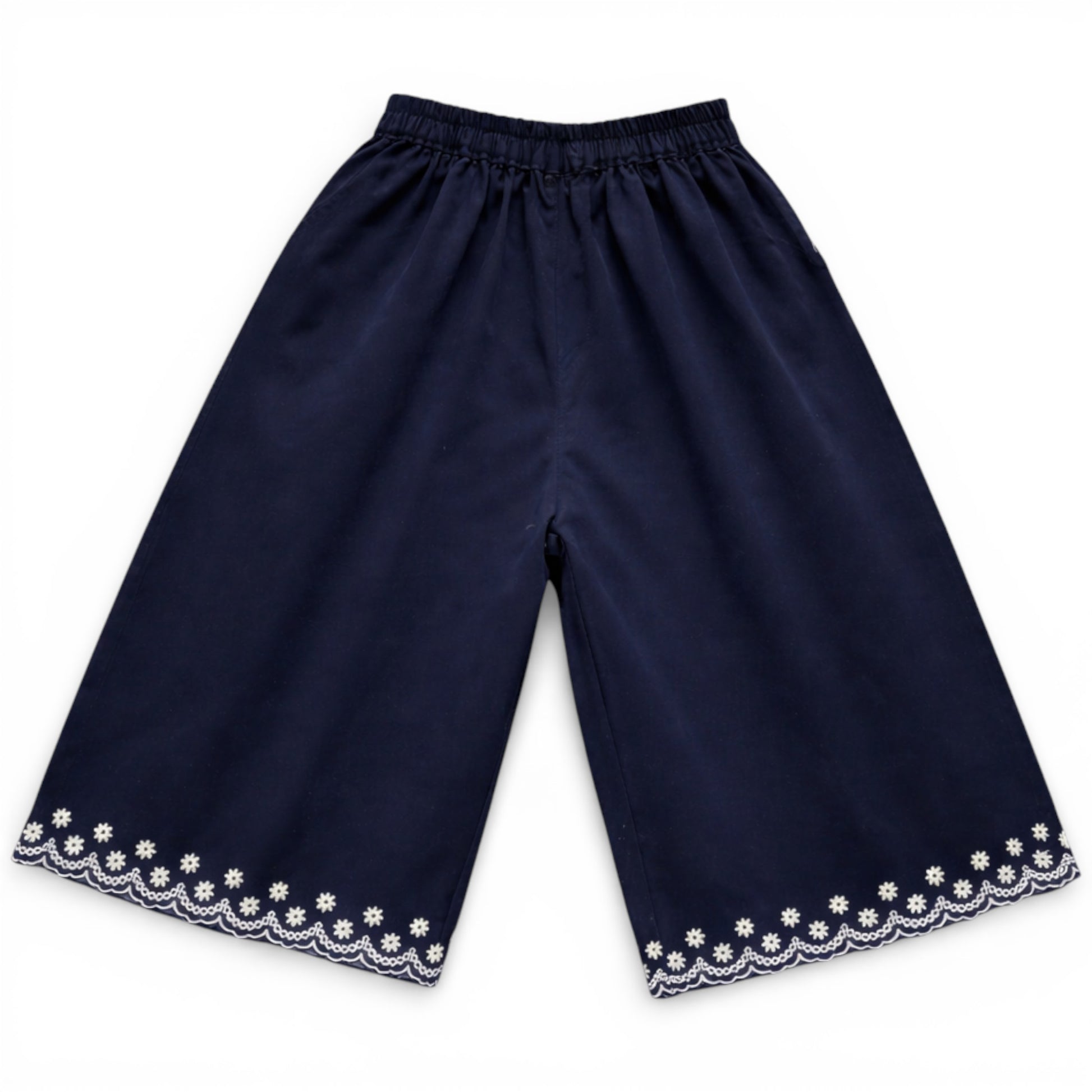 Navy children’s cropped culotte trousers with wide leg and embroidered scalloped hem by That’s Not Fair London