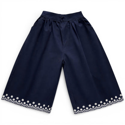 Navy children’s cropped culotte trousers with wide leg and embroidered scalloped hem by That’s Not Fair London