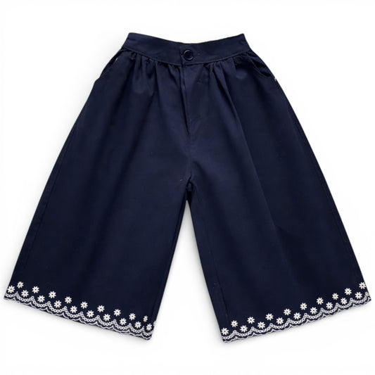 Navy children’s cropped culotte trousers with wide leg and embroidered scalloped hem by That’s Not Fair London