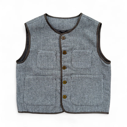 Children’s green striped wool gilet with quilted lining and patch pockets — front view.