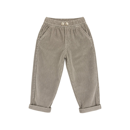 Pople Pants by That’s Not Fair London, taupe ribbed velour children’s trousers with an elasticated waistband, two contrasting buttons, slanted front pockets and turn-up hems.