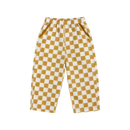 Ramsey Pants by That’s Not Fair London in mustard and white check, featuring a relaxed straight leg and elasticated waistband.