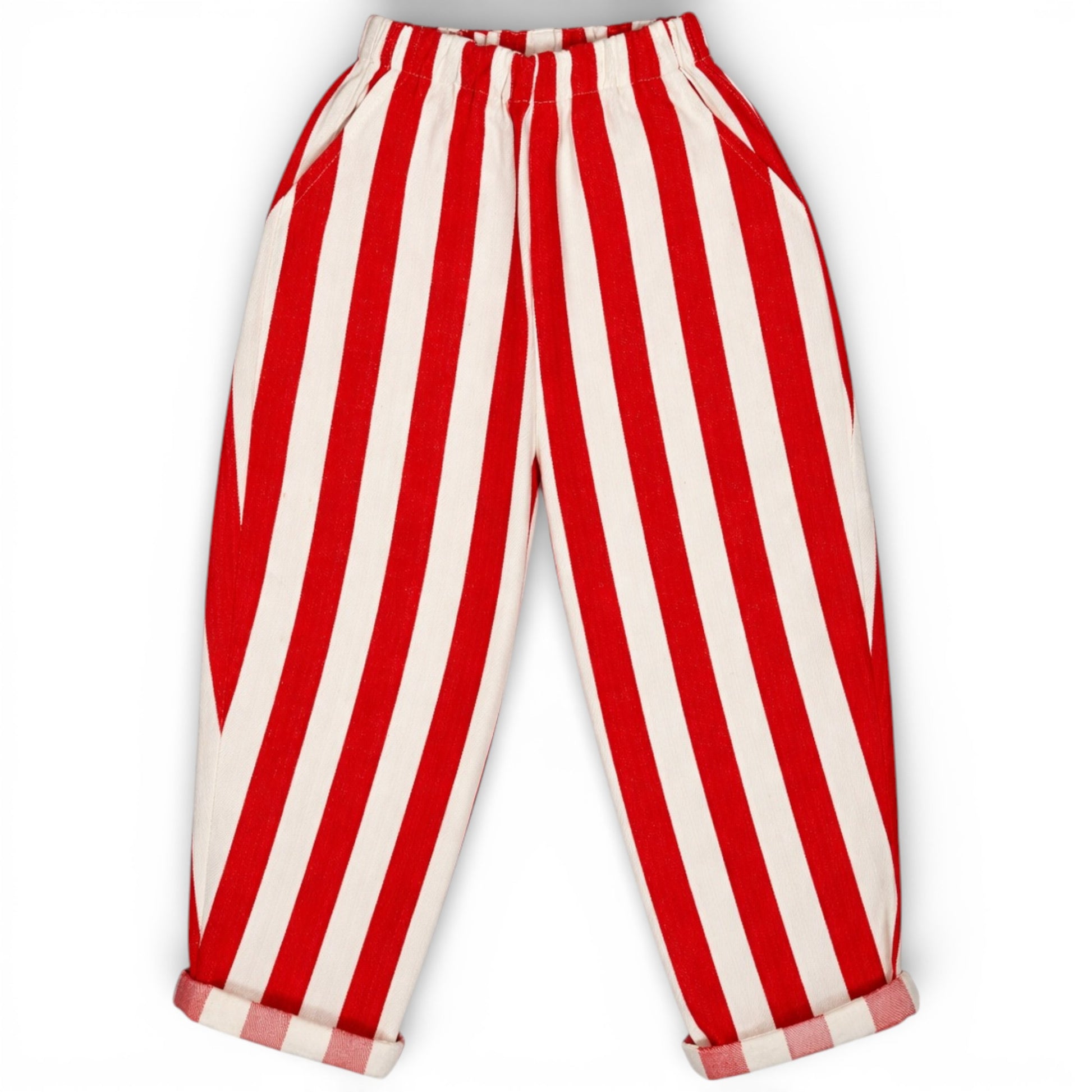 Red and white striped circus-inspired children’s balloon trousers with elasticated waist, slant pockets and rolled hem