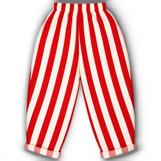 Red and white striped circus-inspired children’s balloon trousers with elasticated waist, slant pockets and rolled hem