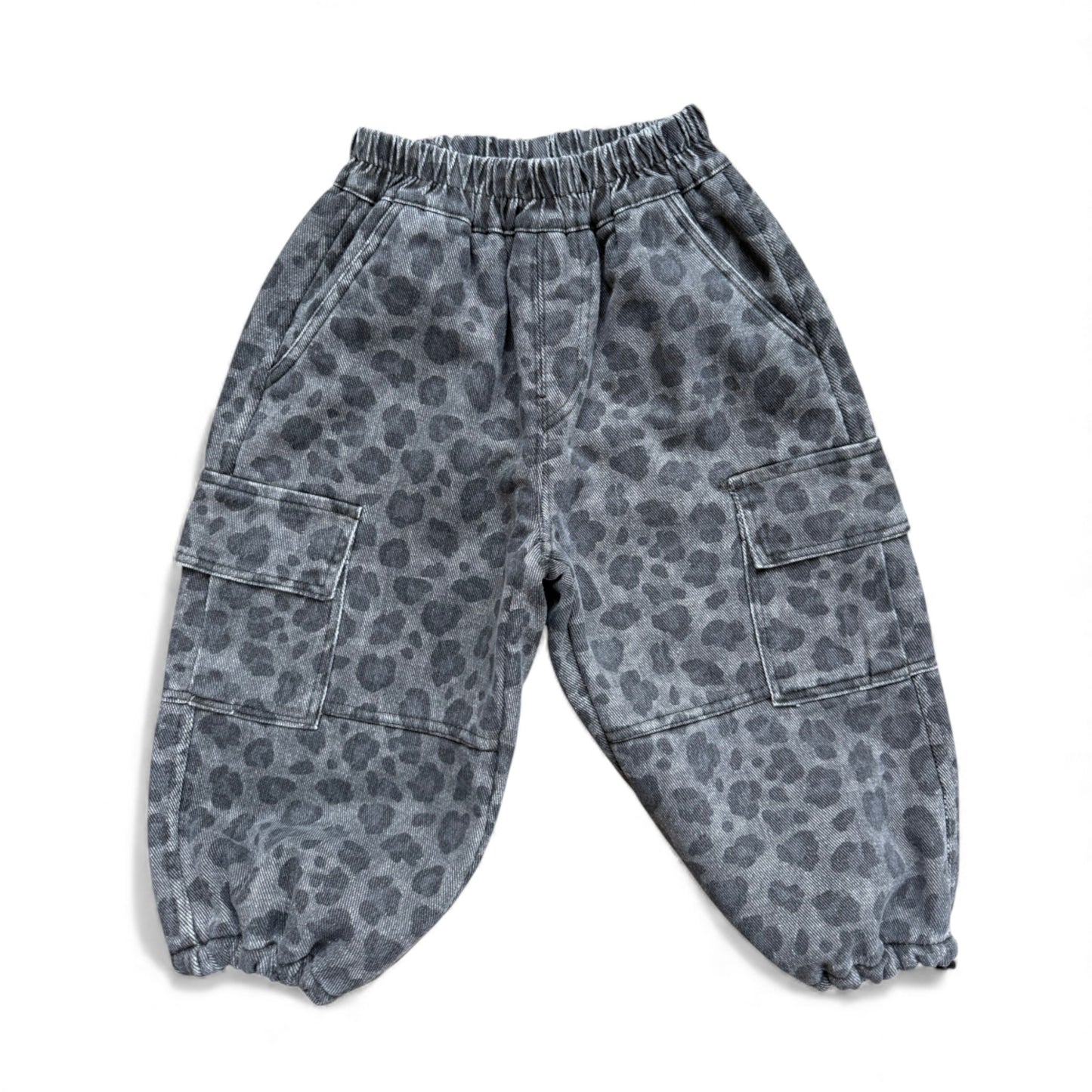 Grey animal-print children’s cargo trousers with slant pockets, cargo pockets, low crotch and drawstring hem — front view.