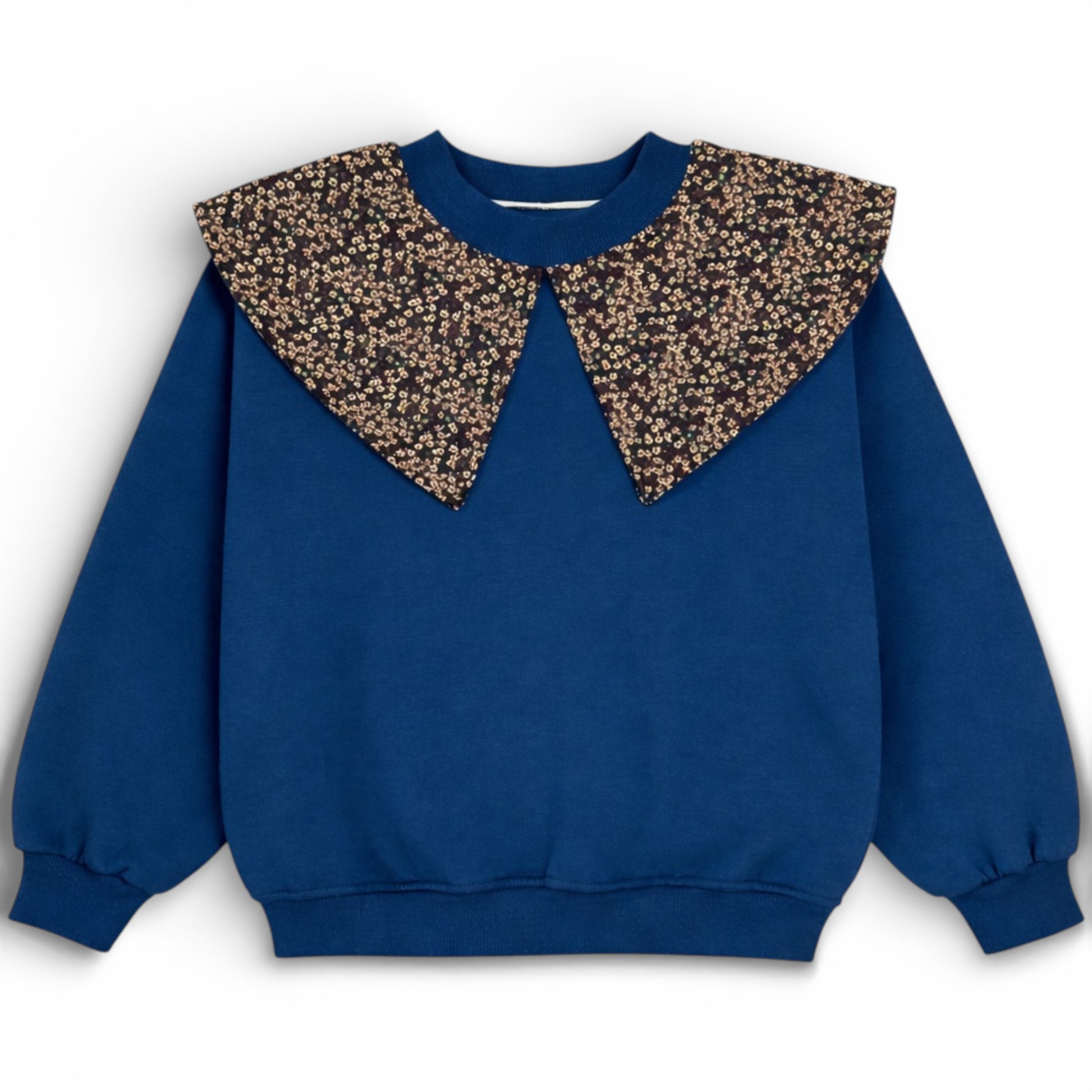 Blue children’s double ply cotton jersey jumper with floral bib detail, balloon cut and ribbed trims - Front view