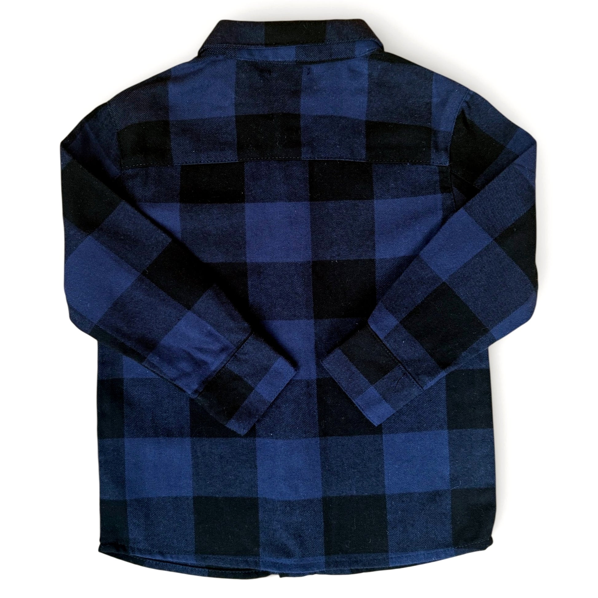 Back view of slim navy buffalo check wool-cotton children’s shirt with curved hem and dropped shoulders by That’s Not Fair London.