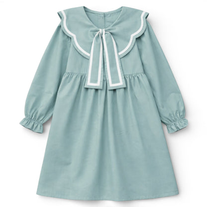 Empire line girls dress with scalloped contrast collar and bow detail by That’s Not Fair London.