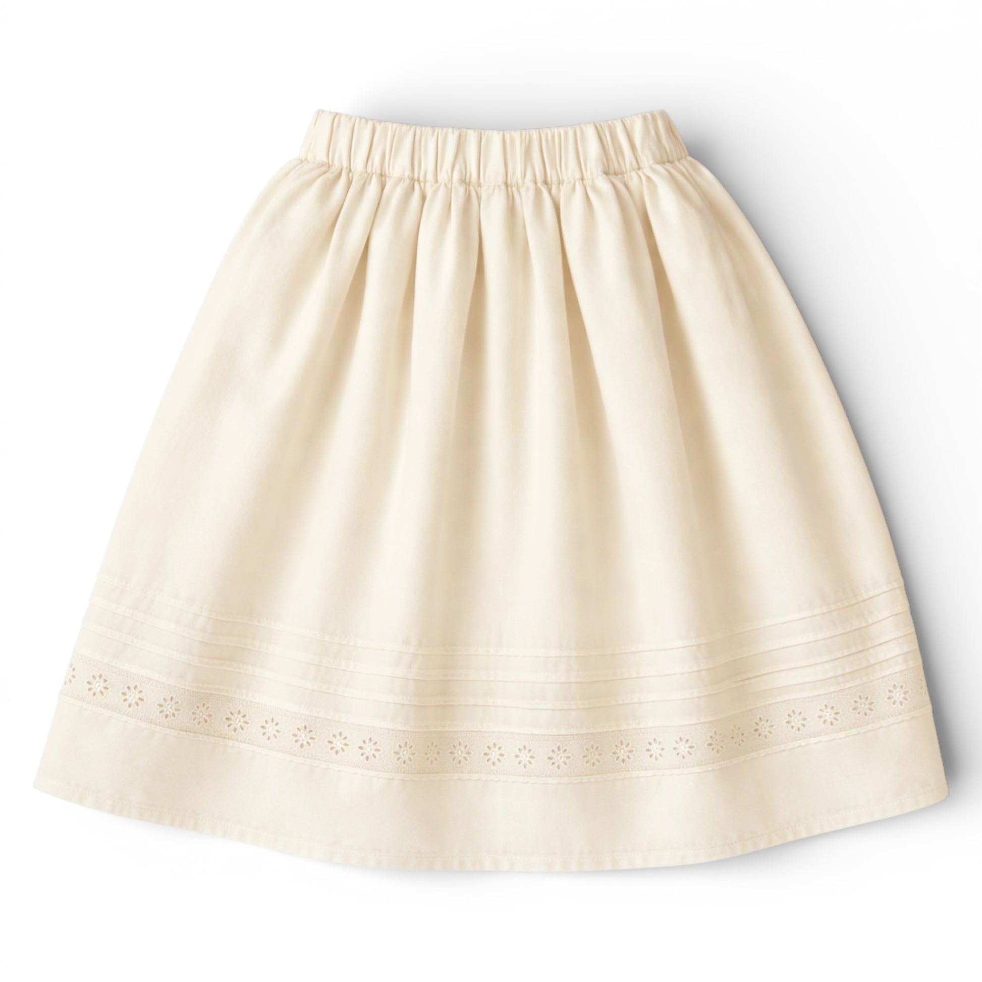 Girls tea‑length cream cotton A‑line skirt with slant pockets and eyelet hem
