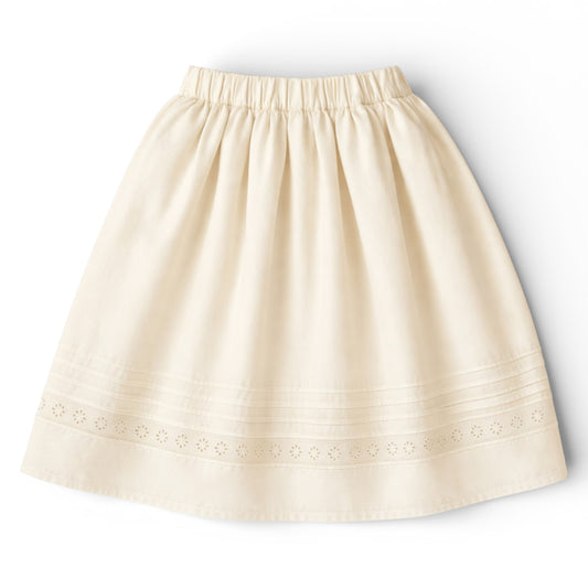 Girls tea‑length cream cotton A‑line skirt with slant pockets and eyelet hem
