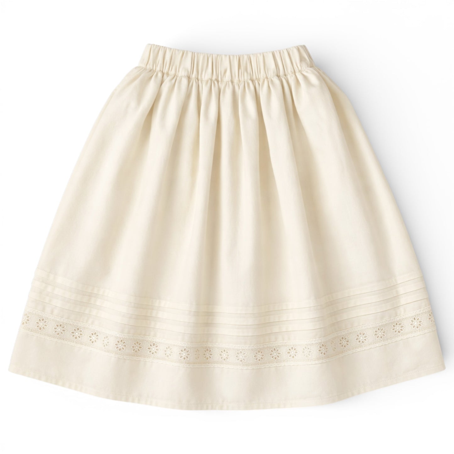 Girls tea‑length cream cotton A‑line skirt with slant pockets and eyelet hem