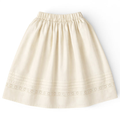 Girls tea‑length cream cotton A‑line skirt with slant pockets and eyelet hem