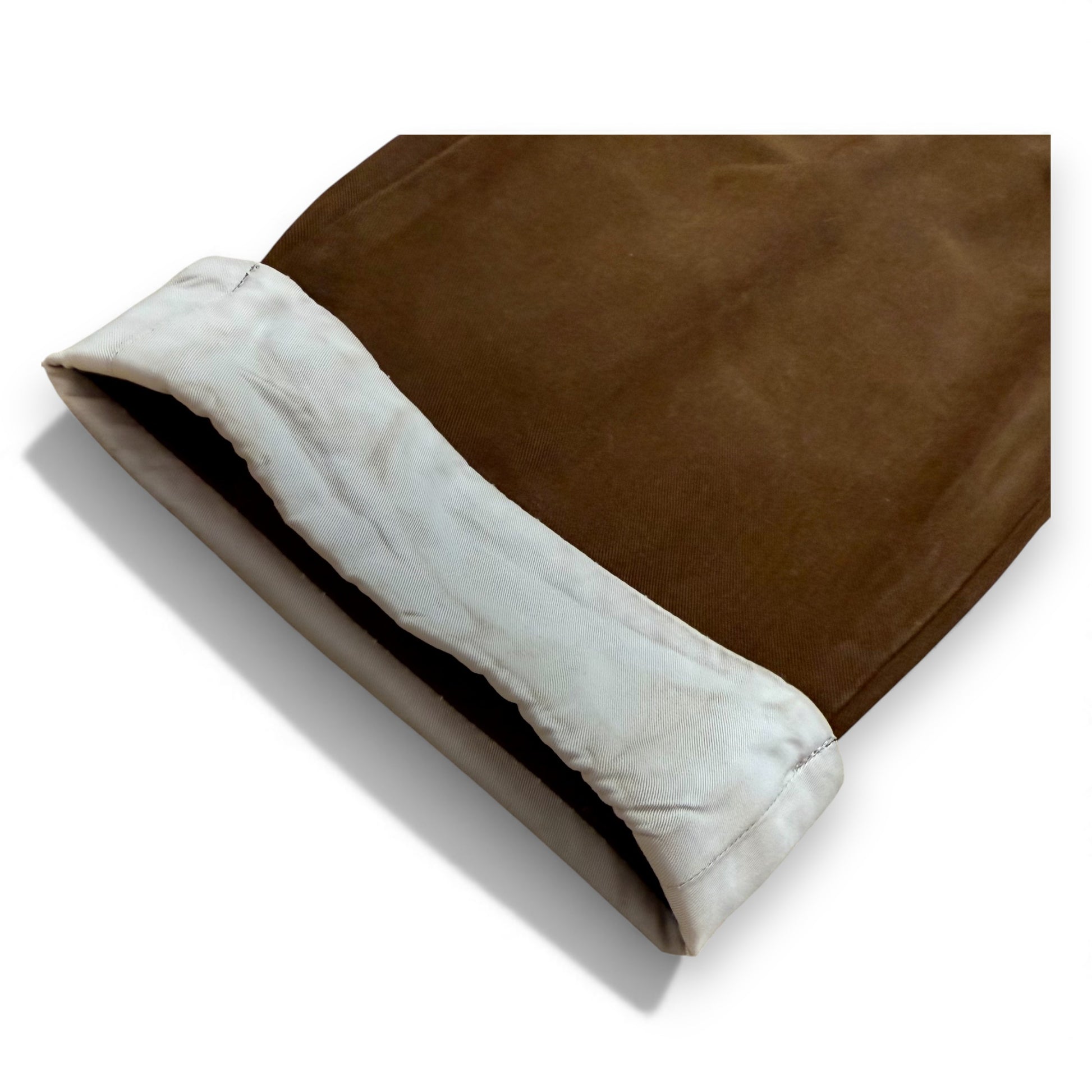 Trousers with contrast turn-up hem detail shown