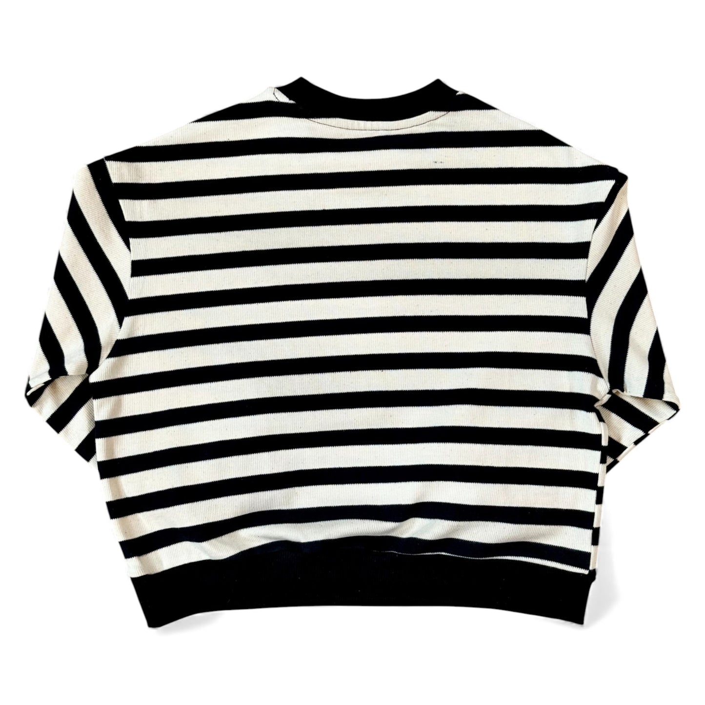 Back view of a black-and-cream striped cotton jersey jumper with drop shoulders and a cropped, boxy fit.