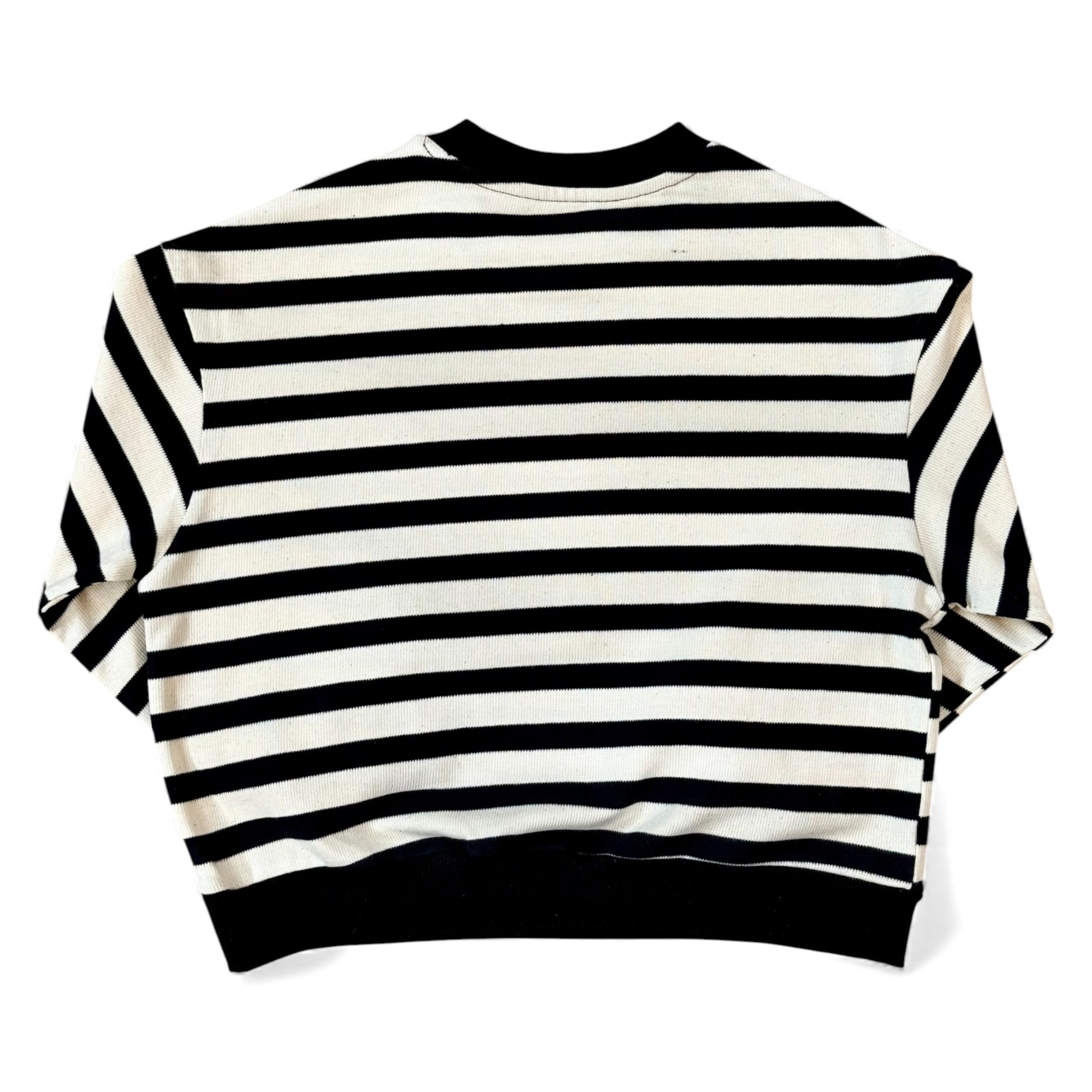 Back view of a black-and-cream striped cotton jersey jumper with drop shoulders and a cropped, boxy fit.