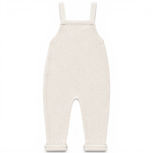 Zayne knitted baby romper in cream garter stitch, lightweight loose fit all-in-one with square bib and covered buttons