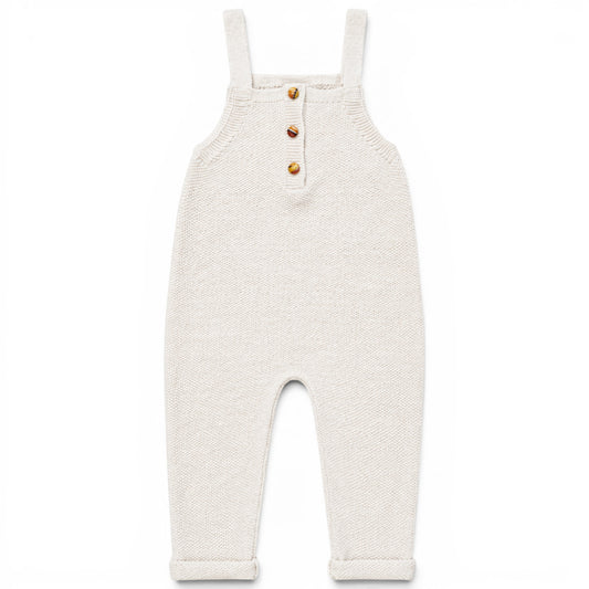 Zayne knitted baby romper in cream garter stitch, lightweight loose fit all-in-one with square bib and covered buttons