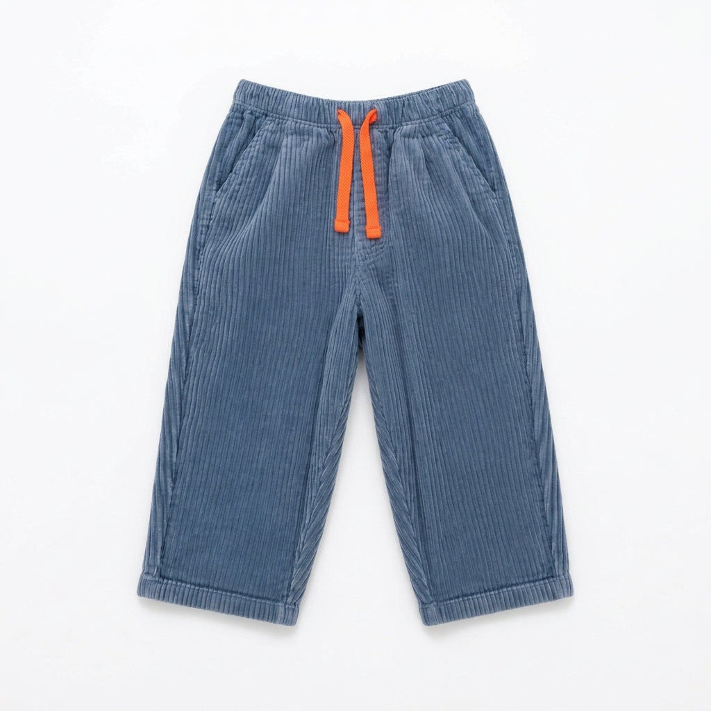 Zoale Cords by That’s Not Fair London, blue corduroy children’s trousers with a relaxed leg, elasticated waistband and contrast colour drawstring.