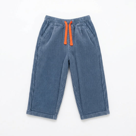 Zoale Cords by That’s Not Fair London, blue corduroy children’s trousers with a relaxed leg, elasticated waistband and contrast colour drawstring.